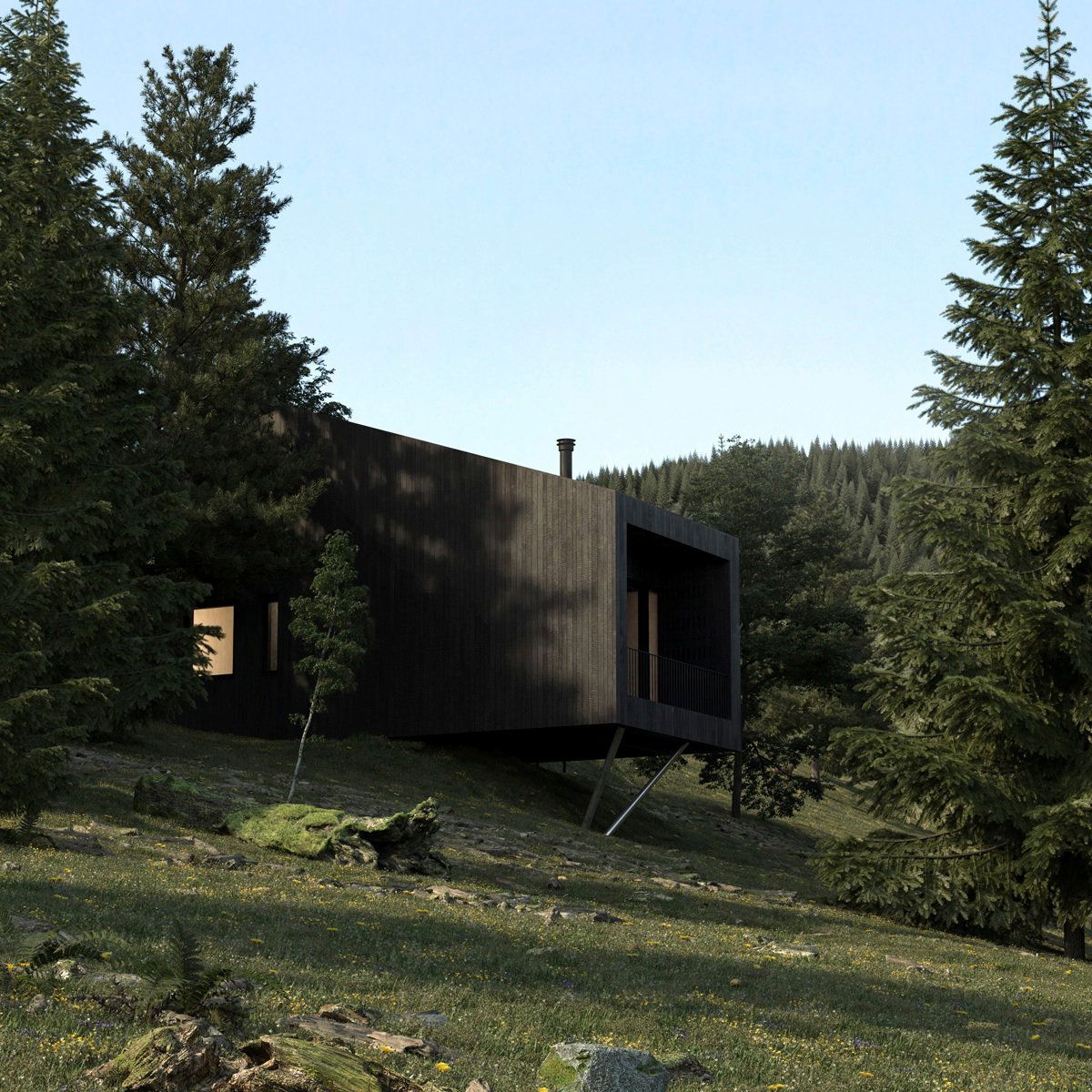 A dark timber-clad prefabricated home in a forest clearing